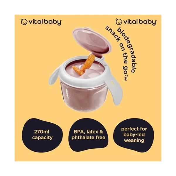Vital Baby Toddler Snack Pot, 6m+, Pink | Dual-Lids | Biodegradable | Dual lids switch between secure storage and independent snacking, with soft silicone slats and easy-grip handles.