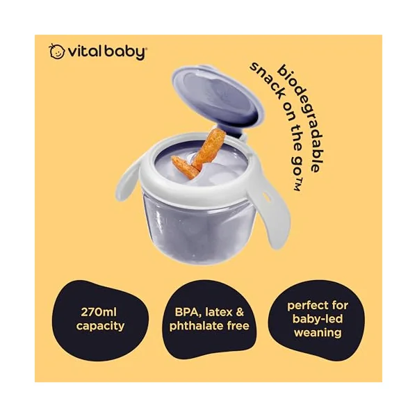 Vital Baby Toddler Snack Pot, 6m+, Purple | Dual-Lids | Biodegradable | Dual lids switch between secure storage and independent snacking, with soft silicone slats and easy-grip handles.