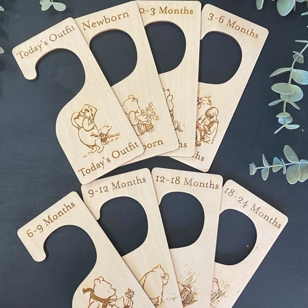 Winnie the Pooh Wooden Baby Clothes Hanger Dividers | Perfect personalised newborn gift or baby shower keepsake, creating treasured memories for new parents.